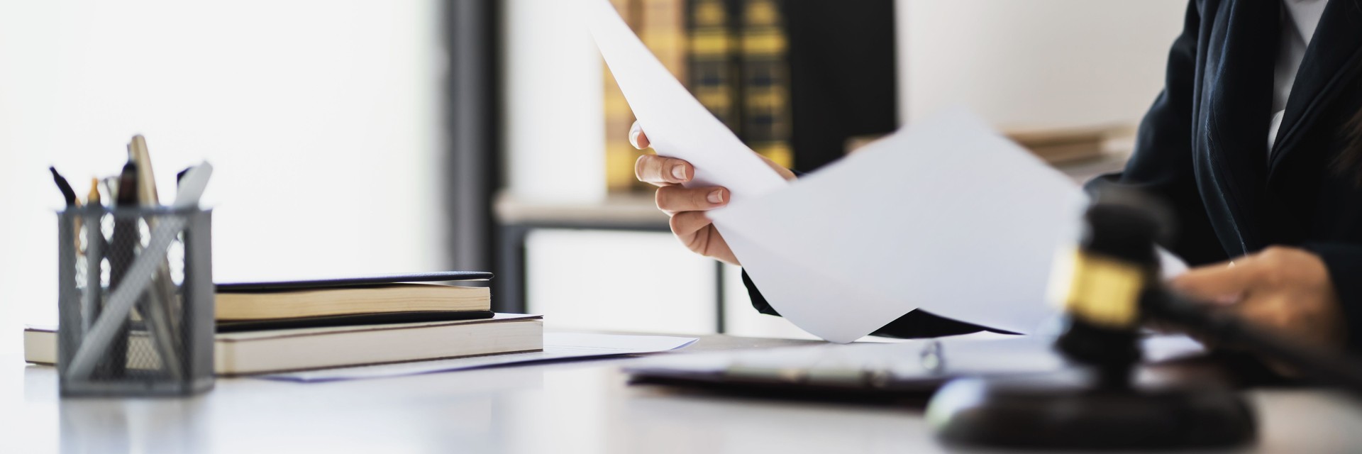 Lawyer businesswoman workingÂ with consult. Legal law Judge Gavel Scale of Justice concept.